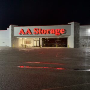 AA Self Storage facility in Farmville VA at night with illuminated signage and secure access