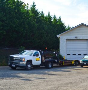 AA Self Storage facility in Lynchburg VA illuminated at night showing office entrance and gated entry