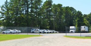 secure outdoor vehicle and commercial truck storage area in Oxford NC surrounded by chain link fencing