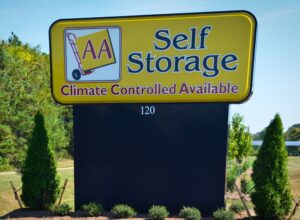 bright roadside self storage sign in Oxford NC advertising climate controlled units and secure access