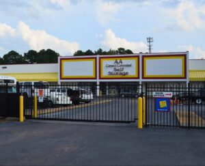exterior of the secure AA Climate Controlled Self Storage facility in Raleigh NC featuring gated entry