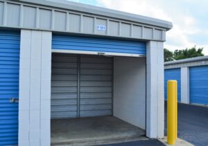 open climate controlled storage unit with carpeted floors and wide roll up doors in Raleigh NC