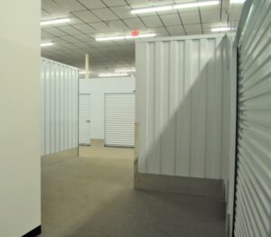 clean interior of an empty climate controlled storage unit with carpeted flooring in Raleigh NC