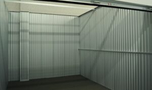 empty interior of a secure self storage unit in Raleigh NC ready for your household or business move
